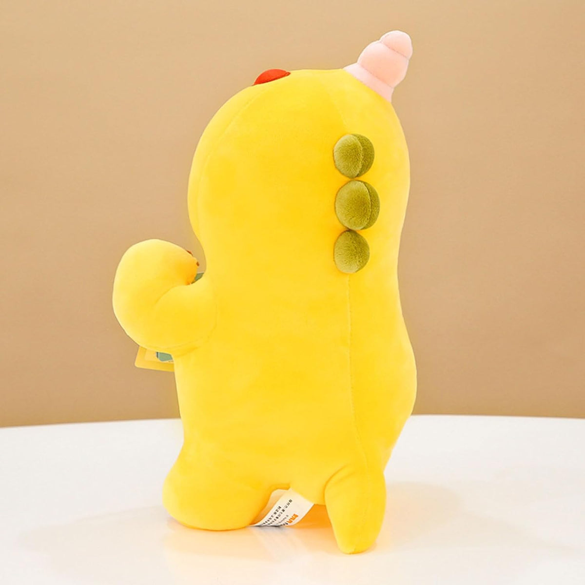 Yellow Dino Plush with Playful Face