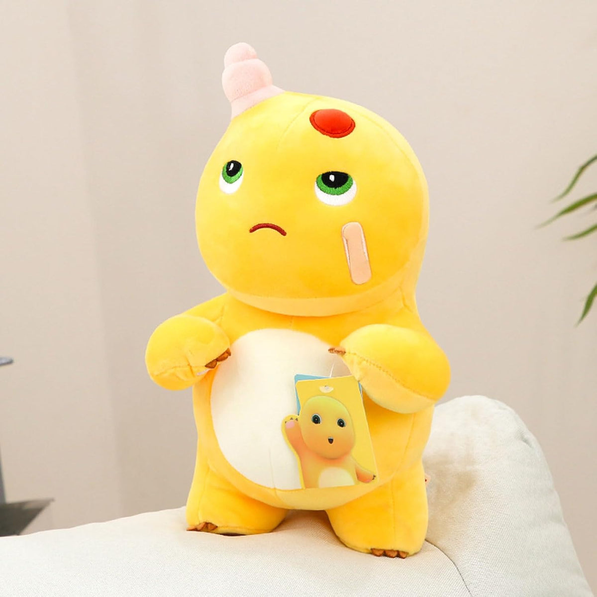 Yellow Dino Plush with Playful Face